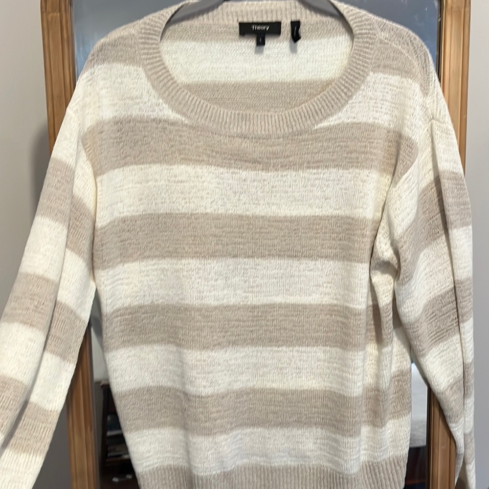 Siri. Size large 10 and white striped lightweight sweater.